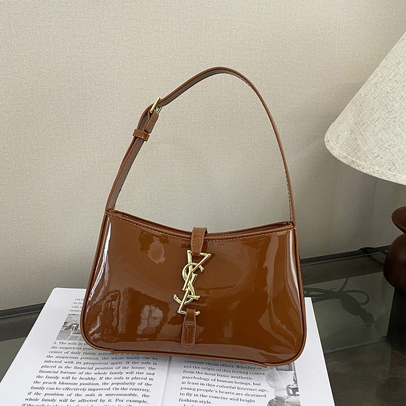 2025 Nueva bolsa transfronteriza elegante, versátil y versátil para la axila, bolso de un solo hombro de moda, bolso de mujer de cuero brillante para mujeres