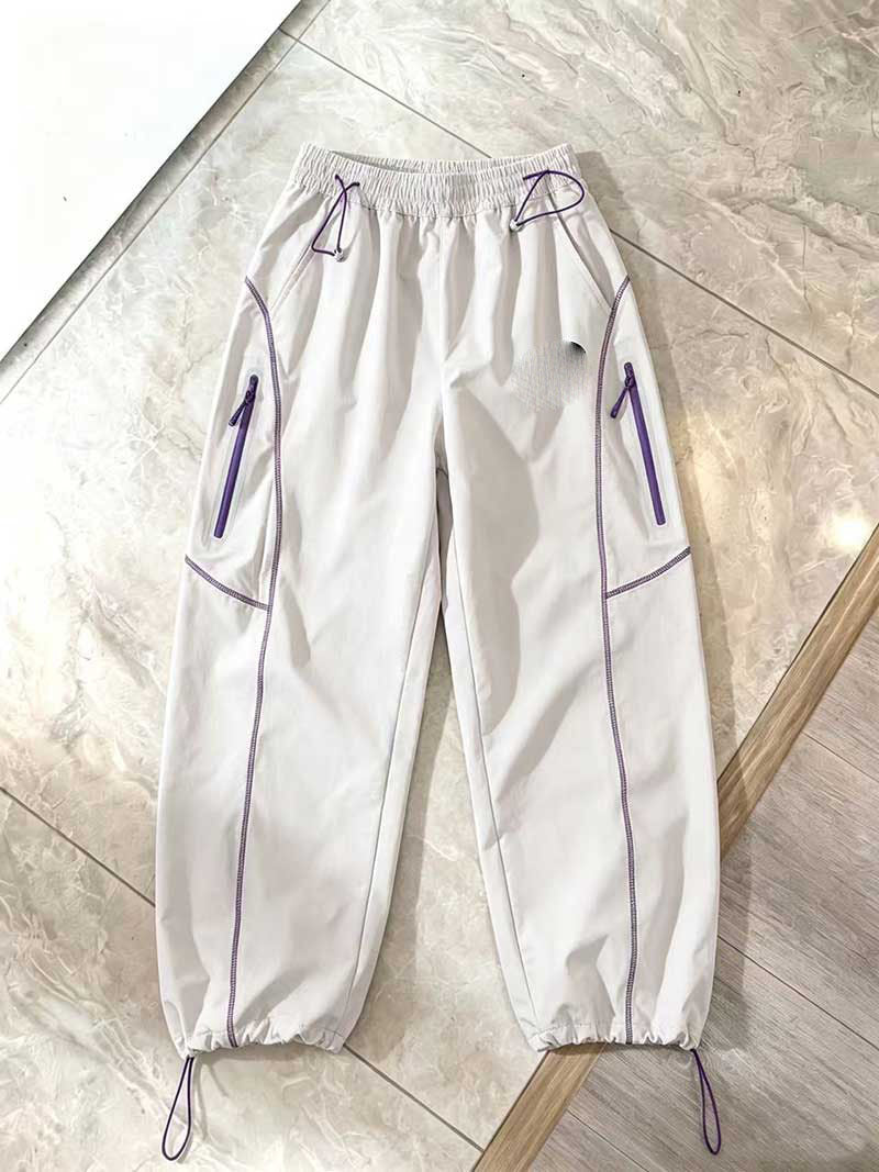 Nouvelle tendance urbaine décontractée 2026 : Pantalons longs taille mi-haute polyvalents et superposés, style unisexe à rayures, couleur unie, respirants, légers et aérés