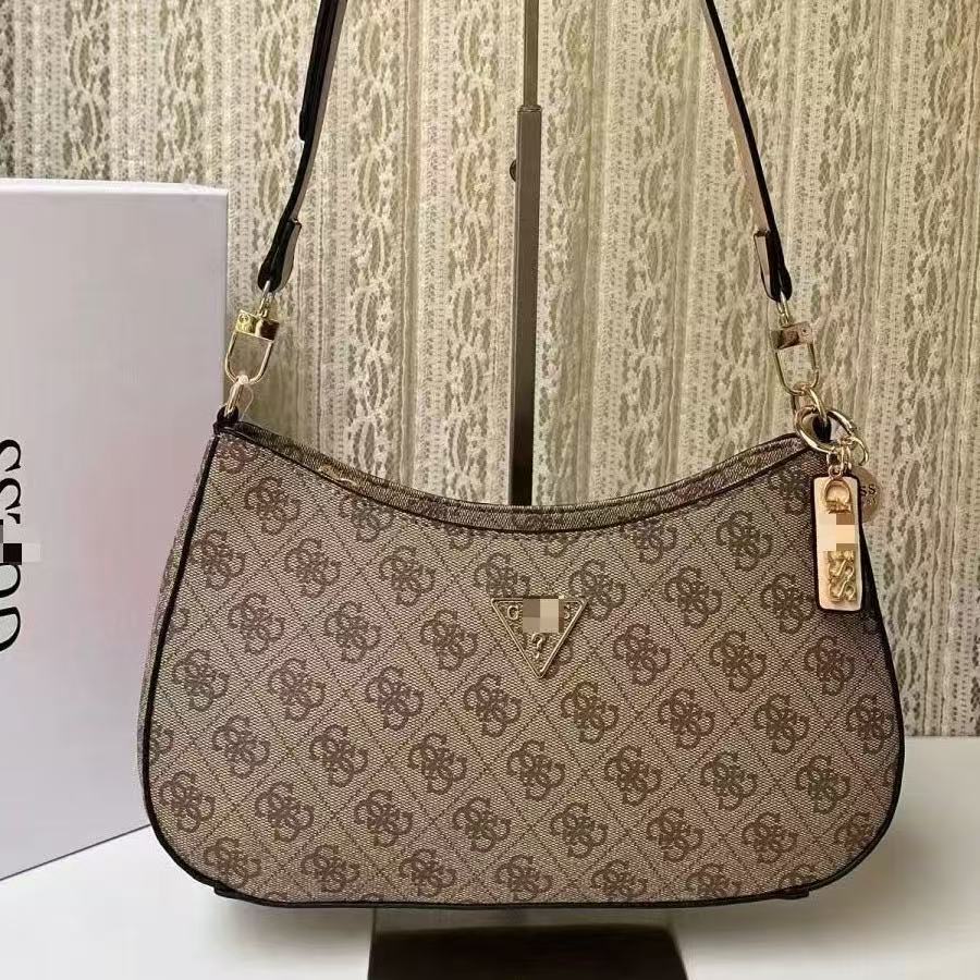 GS Adivina el nuevo bolso europeo y americano sencillo de un solo hombro con viento cruzado y de forma de brazo cruzado, bolso de bolita de color sólido bolso de luna creciente