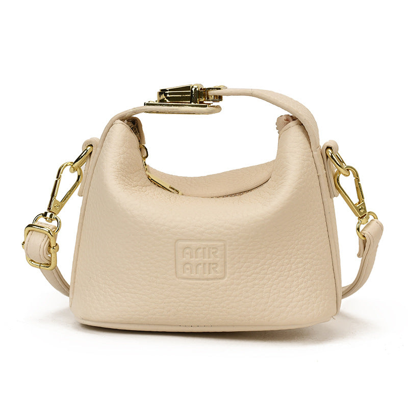 Bolso mini de dumplings de vaquero transfronterizo, bolso ligero de lujo de alta gama, versátil y de moda, bolso de mujer, bolso bandolera infantil de nicho coreano