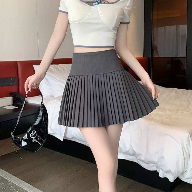 Jupe plissée courte pour femme, nouvelle jupe midi printemps/été, nouvelle jupe trapèze taille haute, amincissante, noir et blanc, anti-exposition
