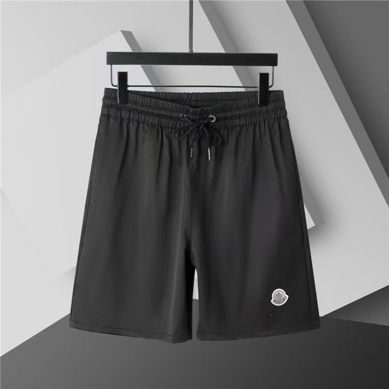 Verano 2026 Nuevos pantalones de playa transfronterizos europeos y americanos de secado rápido, pantalones cortos casuales holgados y de moda al por mayor