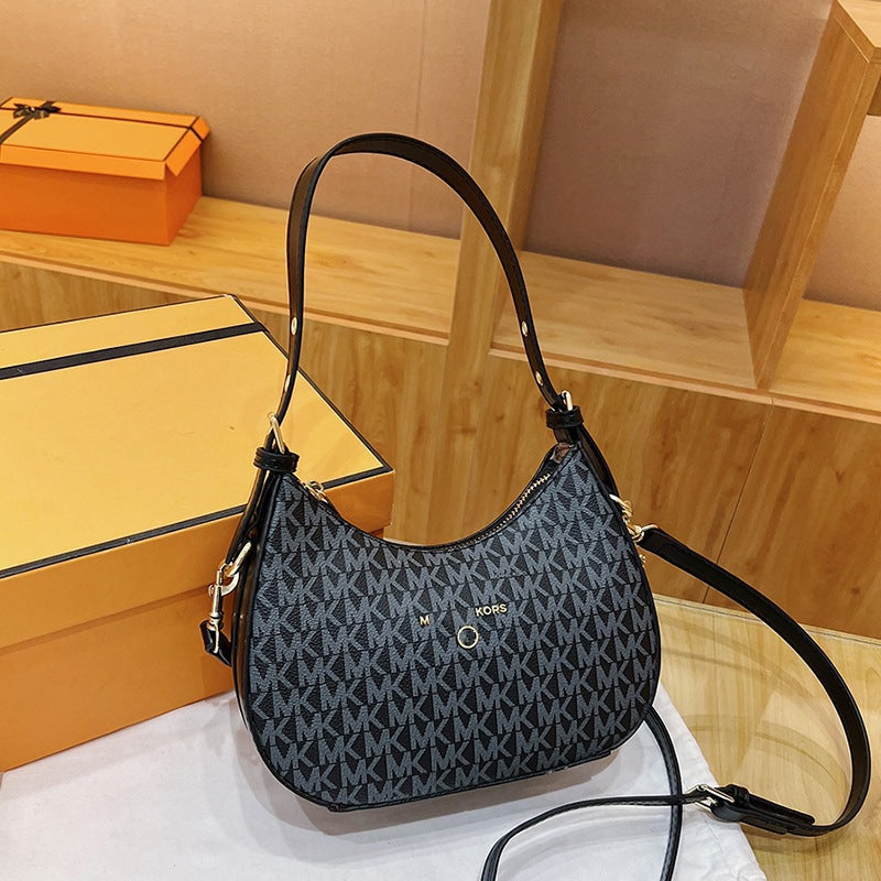 Bolsa de axilas para mujer 2025, nueva y de moda francesa de nicho de alta gama, bolso cruzado de un hombro y media luna