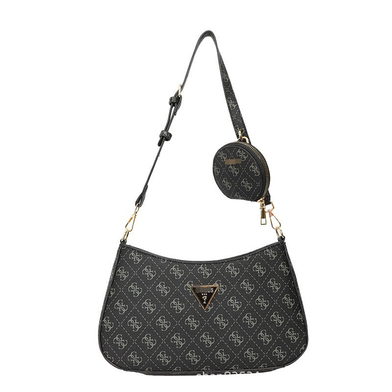 Comercio exterior al por mayor, bolso retro GS Guesser europeo y americano, bolso de hombro de moda de suegra con estampado transfronterizo