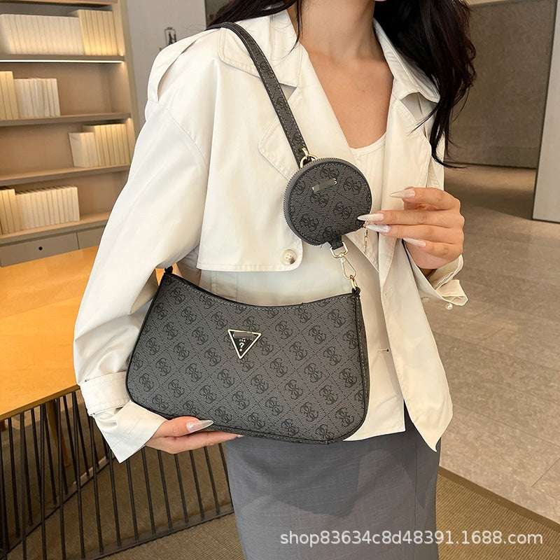 Comercio exterior al por mayor, bolso retro GS Guesser europeo y americano, bolso de hombro de moda de suegra con estampado transfronterizo
