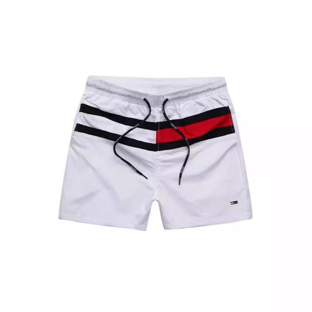 Puesto callejero de fitness para jóvenes de verano transfronterizo, pantalones de tres cuartos de surf en la playa de secado rápido, pantalones cortos deportivos, pantalones cortos de playa europeos y americanos para hombres