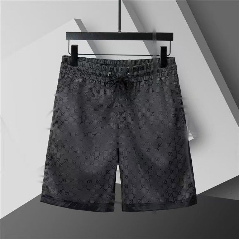 Verano 2026 Nuevos pantalones de playa transfronterizos europeos y americanos de secado rápido, pantalones cortos casuales holgados y de moda al por mayor