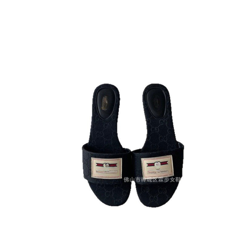 Nuevas chanclas de verano para mujer 2026 con letra de tela G-Family Ropa exterior de verano, zapatillas planas versátiles para mujeres cómodas para vacaciones en la playa
