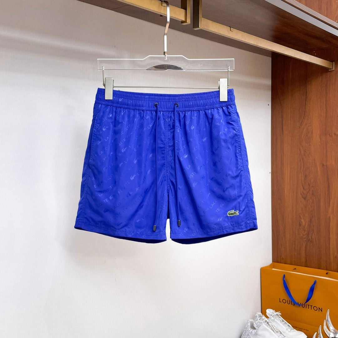 Nuevos pantalones cortos de playa para verano, pantalones deportivos casuales de secado rápido, estilo masculino holgado en stock, otras marcas