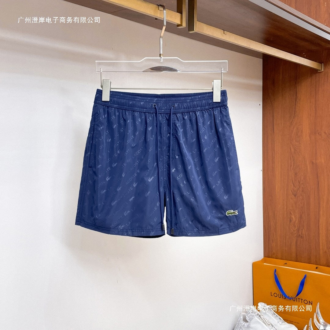 Nuevos pantalones cortos de playa para verano, pantalones deportivos casuales de secado rápido, estilo masculino holgado en stock, otras marcas