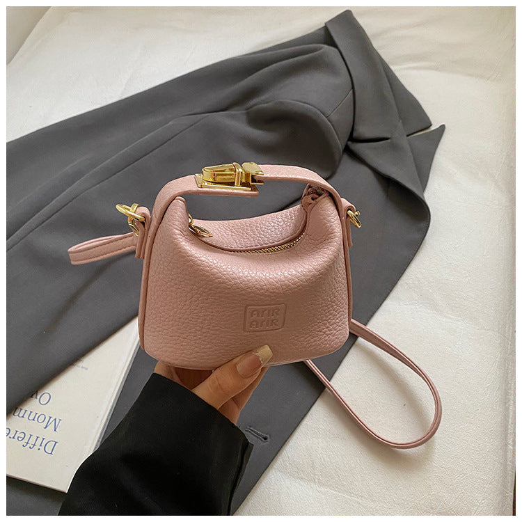 2025 Otoño Nuevo Nicho Bolso de Mano de Color Liso Alta Estética Casual Mono de Cuero Suave de Hombro Bandolera Bolso Pequeño Cuadrado