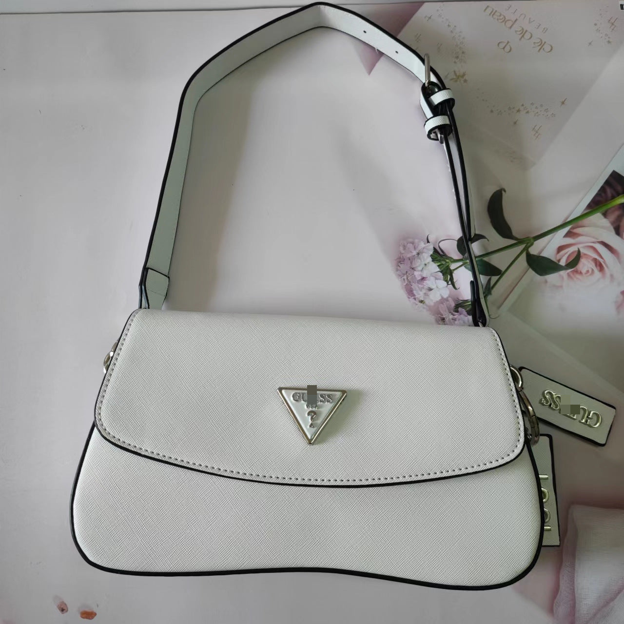 Moda europea y americana, nueva moda de colores sólidos con estampado curva retro, bolso de axila con colgantes de flores antiguas, bolso de mujer
