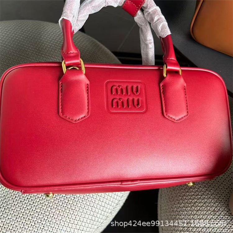 MIU Bowling Otoño/Invierno 2024 Nuevo Nicho Bolso de Gran Capacidad para Mujer Bolso Almohada Bolso Bandolera de un solo hombro Boston Mujer