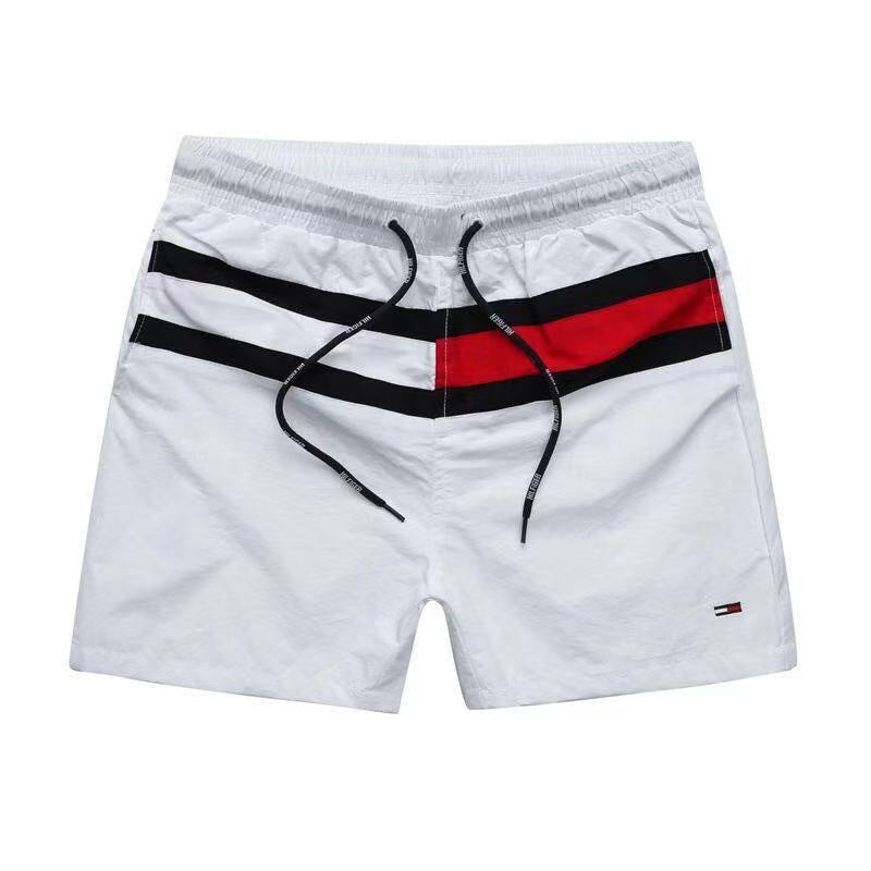 Puesto callejero de fitness para jóvenes de verano transfronterizo, pantalones de tres cuartos de surf en la playa de secado rápido, pantalones cortos deportivos, pantalones cortos de playa europeos y americanos para hombres