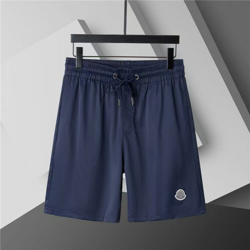 Verano 2026 Nuevos pantalones de playa transfronterizos europeos y americanos de secado rápido, pantalones cortos casuales holgados y de moda al por mayor