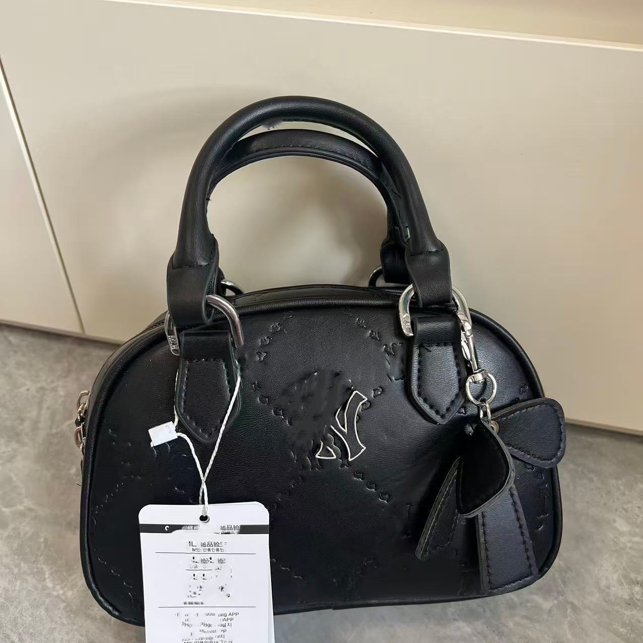 Bolsa de bolos nueva para ML coreana transfronteriza colgante, bolso de un solo hombro, bolso de mano, bolso versátil de moda, bolso de comercio exterior para mujeres