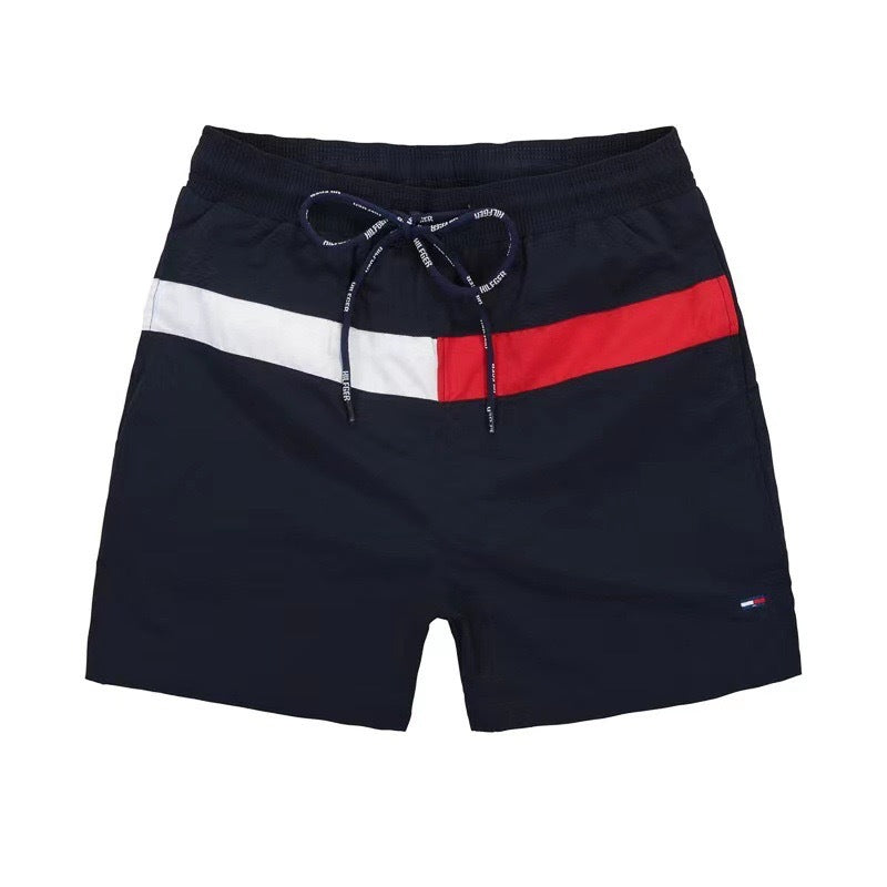 Puesto callejero de fitness para jóvenes de verano transfronterizo, pantalones de tres cuartos de surf en la playa de secado rápido, pantalones cortos deportivos, pantalones cortos de playa europeos y americanos para hombres