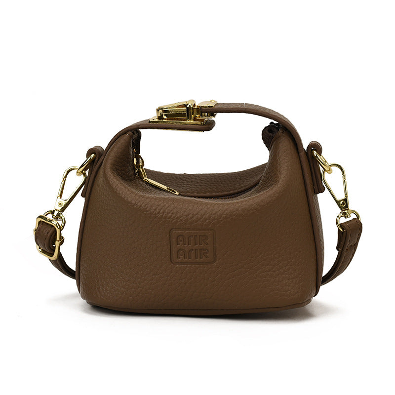 Bolso mini de dumplings de vaquero transfronterizo, bolso ligero de lujo de alta gama, versátil y de moda, bolso de mujer, bolso bandolera infantil de nicho coreano