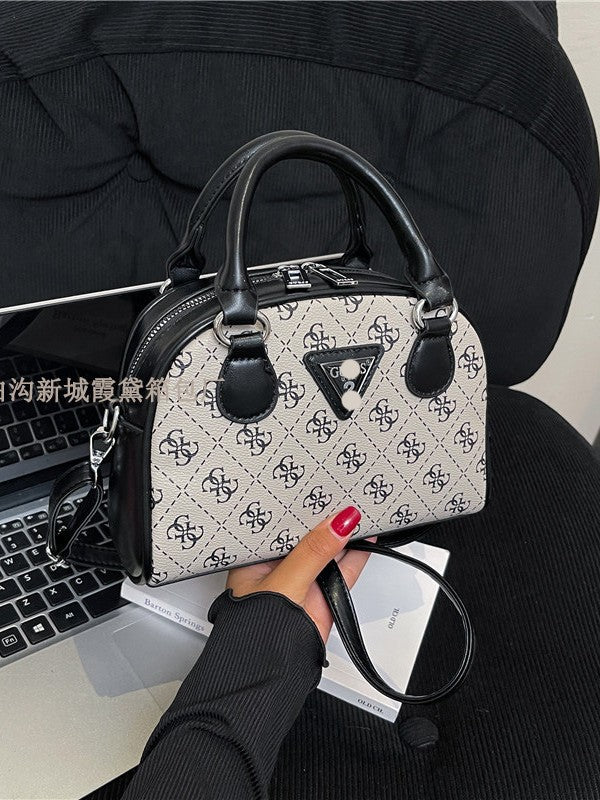 Comercio extranjero bolso de un solo hombro flor antigua para mujer otoño e invierno 2025 bolso de bolos contrastante bolso bandolera de moda y versátil