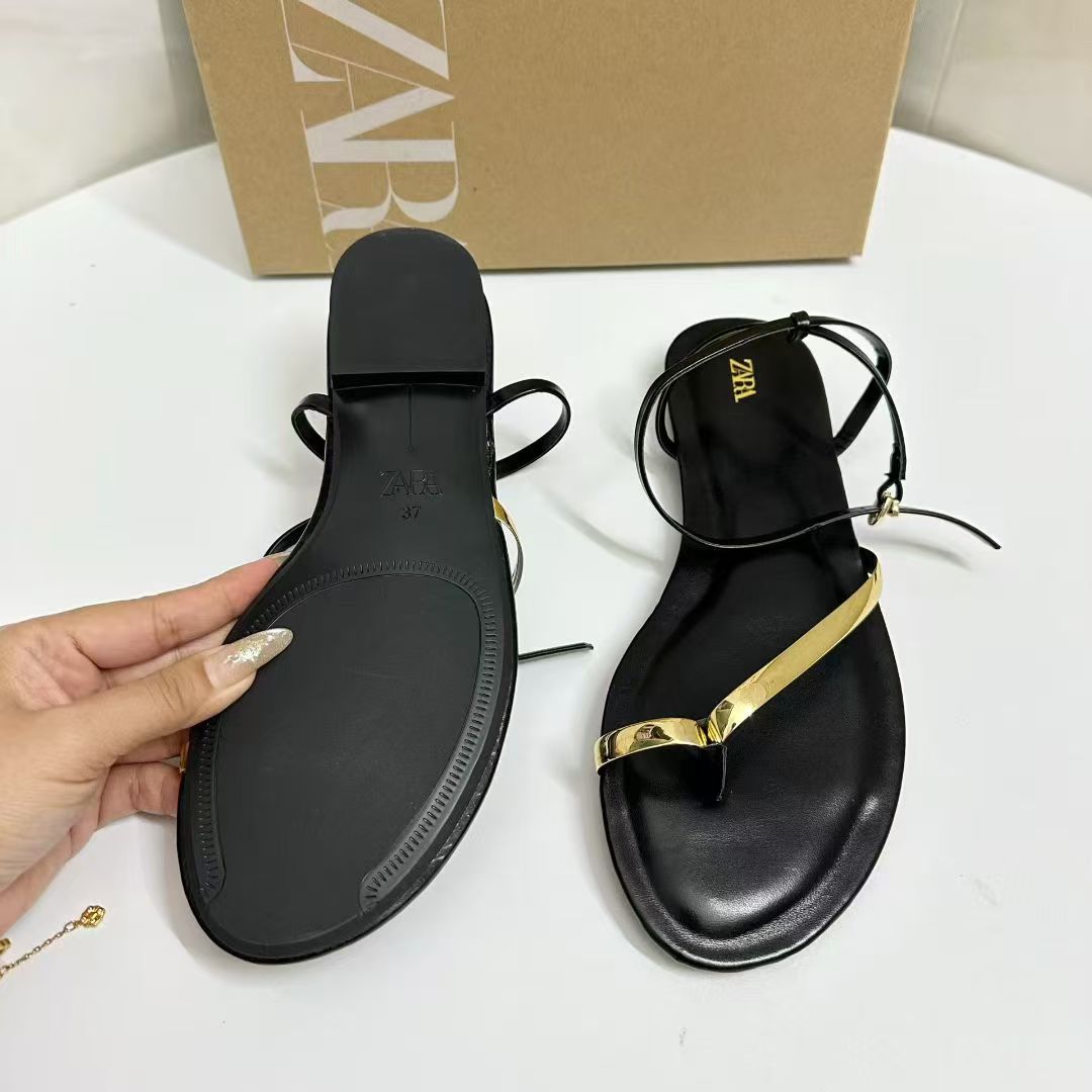 ZA2025 Zapatillas Nuevas de Otoño para Mujer Europeas y Americanas: Sandalias Tacones Planos Tacones Metálicos Negros con Tiras Metálicas con Cordones