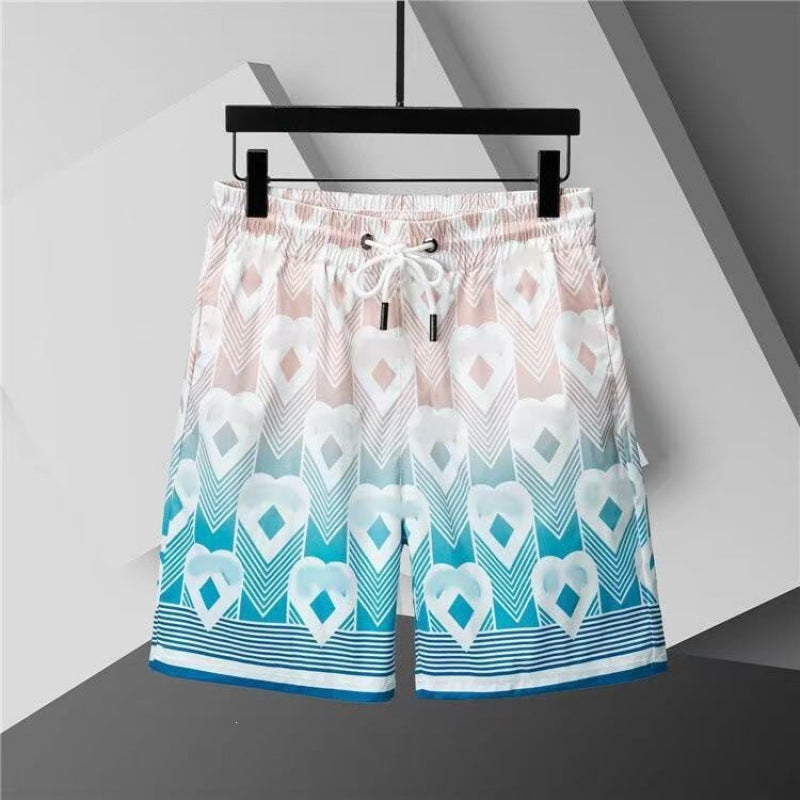Verano 2026 Nuevos pantalones de playa transfronterizos europeos y americanos de secado rápido, pantalones cortos casuales holgados y de moda al por mayor